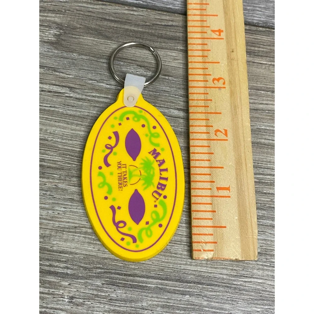 Vintage Malibu Rum‎ Yellow Rubber Keychain Mardi Gras Carnival Logo USA Made